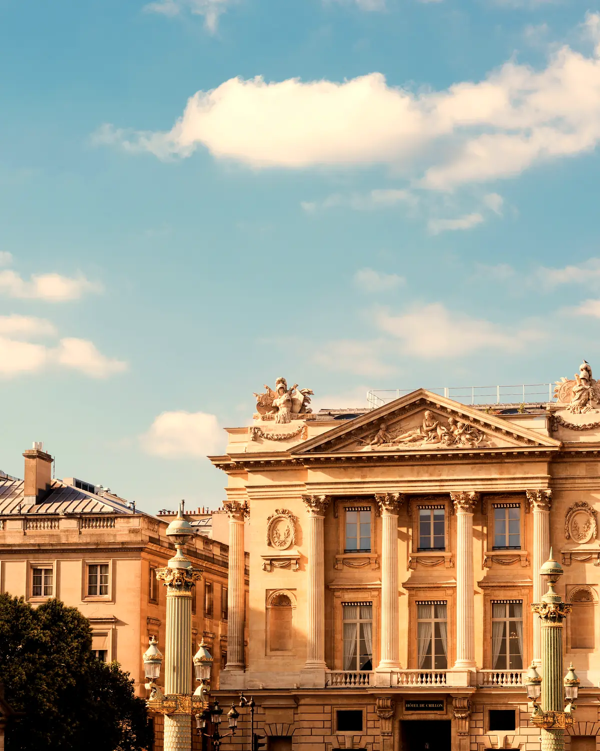 Exterior: the colonnaded Neoclassical facade on Place de la Concorde, with one of the square's statues and lamp posts in the foreground (asset 'RWCRI ......