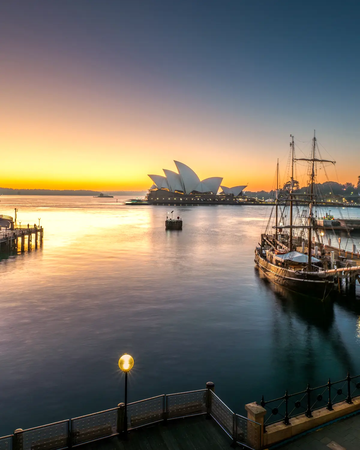 Sunrise view across Campbells Cove: the hotel building on the waterfront at left, Sydney Opera House in the background (gallery file "Sunrise View")